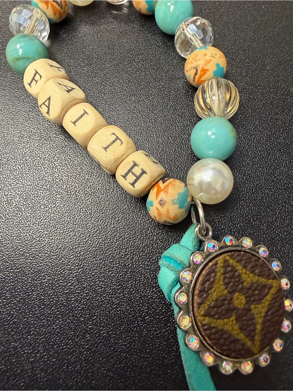 Faith Beaded Necklace with Turquoise Accent and Decorative LV Pendant